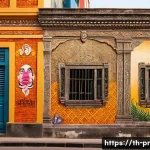 Home 20 장소 특정적 예술의 실천적 적용 - **Prompt:** "A vibrant street art mural adorning the weathered wall of a historic building in Bangko...